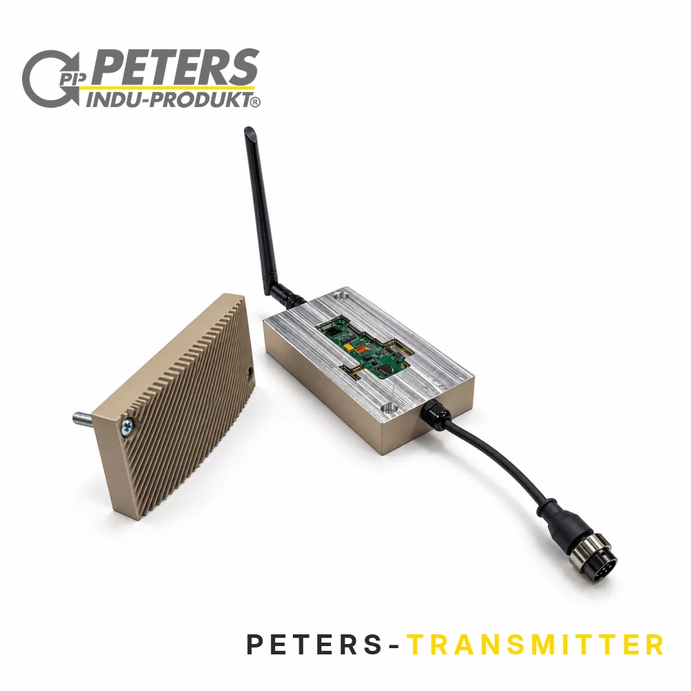 Peters Transmitter: Funkmodul mit Antenne im Aluminiumgehäuse mit Rundsteckverbinder